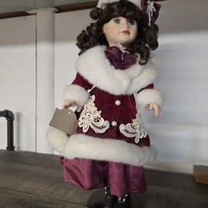 Elegant Burgundy Doll with White Trim